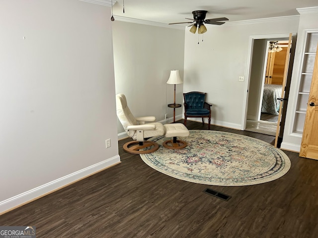 6121 N Main St SE, Acworth, GA 30101 - living area with baseboards, crown molding, wood finished floors, and ceiling fan