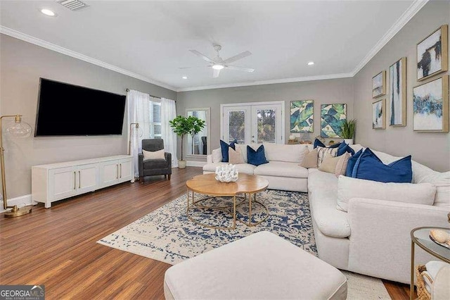 123 E Commons Dr, Saint Simons, GA 31522 - living area featuring wood finished floors, a ceiling fan, crown molding, french doors, and recessed lighting