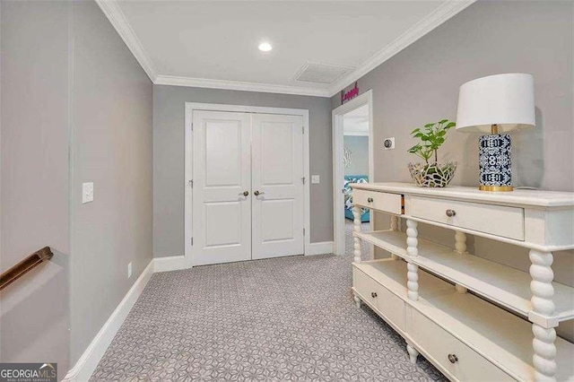 123 E Commons Dr, Saint Simons, GA 31522 - hallway featuring crown molding, light carpet, and recessed lighting