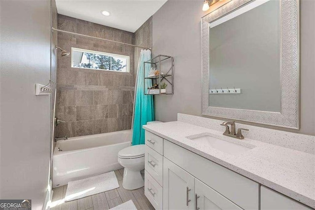 123 E Commons Dr, Saint Simons, GA 31522 - bathroom with vanity and shower / bathtub combination with curtain