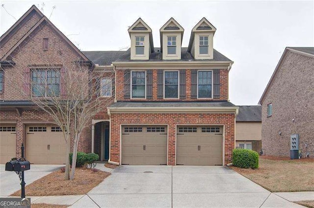 4854 Allston Ln, Peachtree Corners, GA 30092 - view of front of home featuring driveway, brick siding, and a garage
