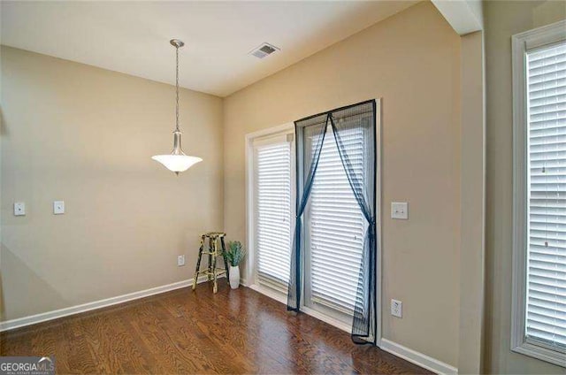 4854 Allston Ln, Peachtree Corners, GA 30092 - unfurnished room with a healthy amount of sunlight, baseboards, visible vents, and dark wood-style flooring
