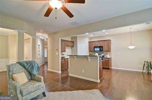 4854 Allston Ln, Peachtree Corners, GA 30092 - interior space featuring baseboards, visible vents, ceiling fan, and dark wood-type flooring