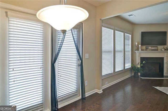 4854 Allston Ln, Peachtree Corners, GA 30092 - room details with baseboards, a fireplace, visible vents, and wood finished floors