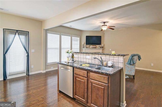 4854 Allston Ln, Peachtree Corners, GA 30092 - kitchen featuring dark stone counters, a sink, dark wood-style floors, dishwasher, and a ceiling fan
