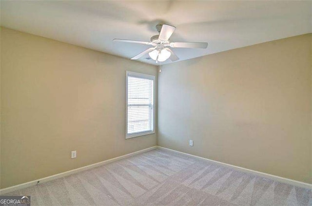 4854 Allston Ln, Peachtree Corners, GA 30092 - carpeted empty room featuring baseboards and a ceiling fan