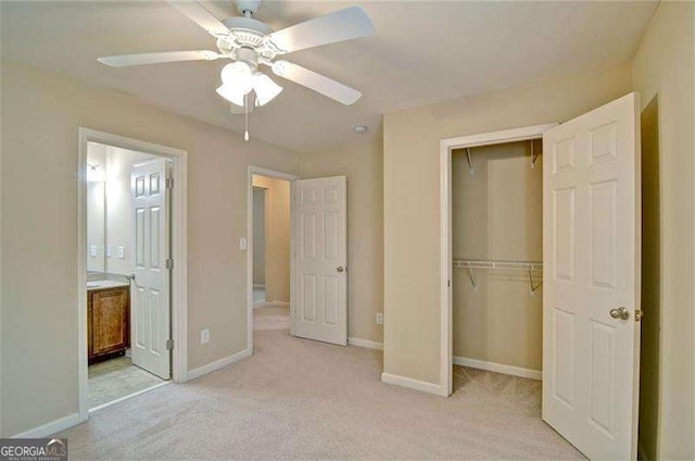 4854 Allston Ln, Peachtree Corners, GA 30092 - unfurnished bedroom featuring a closet, baseboards, a ceiling fan, and light colored carpet