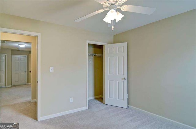 4854 Allston Ln, Peachtree Corners, GA 30092 - unfurnished bedroom with baseboards, carpet flooring, a closet, and a ceiling fan