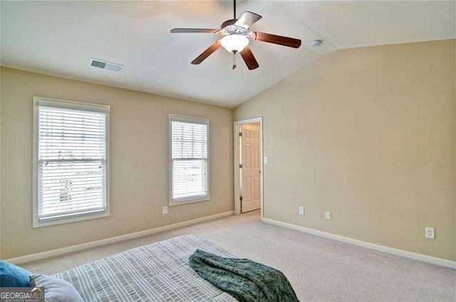 4854 Allston Ln, Peachtree Corners, GA 30092 - bedroom with visible vents, baseboards, ceiling fan, vaulted ceiling, and light colored carpet