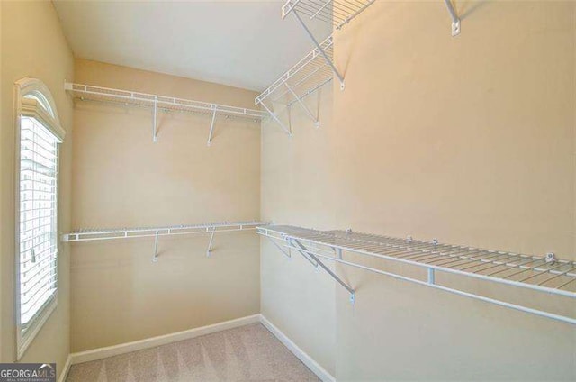 4854 Allston Ln, Peachtree Corners, GA 30092 - walk in closet with carpet flooring