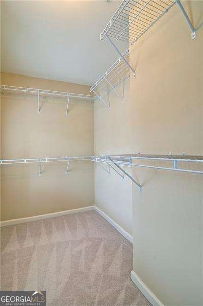 4854 Allston Ln, Peachtree Corners, GA 30092 - spacious closet with carpet flooring