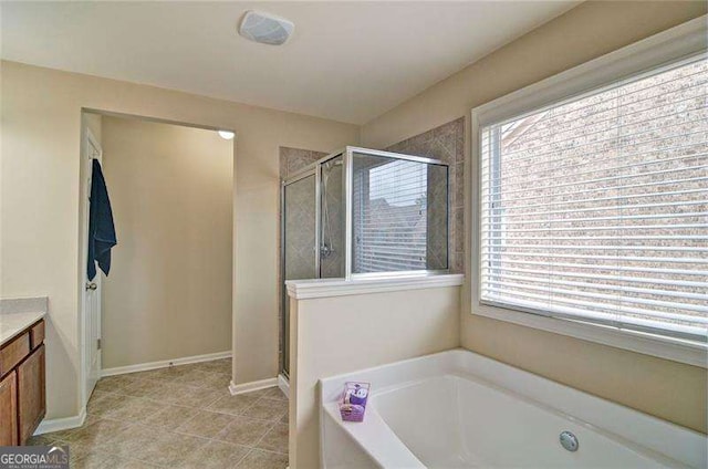 4854 Allston Ln, Peachtree Corners, GA 30092 - full bathroom with tile patterned flooring, vanity, a bath, and a shower stall
