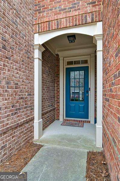 4854 Allston Ln, Peachtree Corners, GA 30092 - doorway to property featuring brick siding