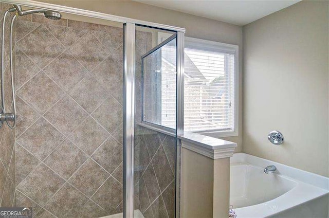 4854 Allston Ln, Peachtree Corners, GA 30092 - bathroom featuring a stall shower, a wealth of natural light, and a bath