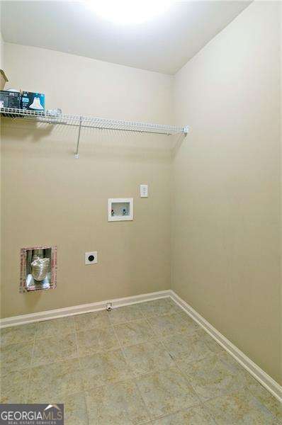4854 Allston Ln, Peachtree Corners, GA 30092 - laundry room with baseboards, laundry area, hookup for a washing machine, and electric dryer hookup