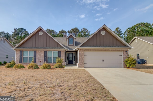 174 Livingston Ct, Winder, GA 30680 - craftsman-style home featuring board and batten siding, brick siding, and concrete driveway