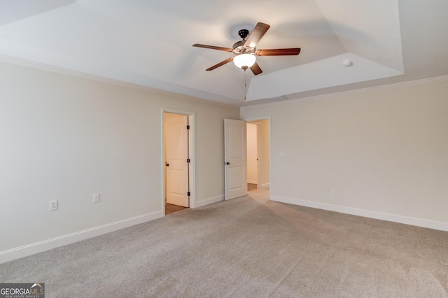 174 Livingston Ct, Winder, GA 30680 - unfurnished room with a tray ceiling, carpet, ceiling fan, and ornamental molding
