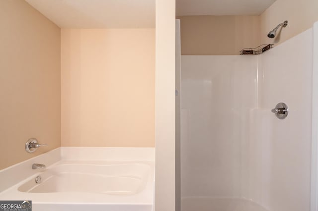 174 Livingston Ct, Winder, GA 30680 - bathroom with a shower and a garden tub