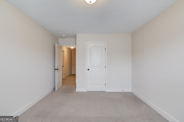 174 Livingston Ct, Winder, GA 30680 - unfurnished bedroom featuring light carpet and baseboards