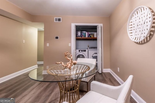 6851 Roswell Rd Unit A-12, Atlanta, GA 30328 - dining area with separate washer and dryer, wood finished floors, and baseboards
