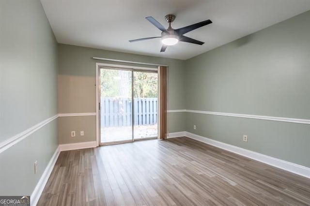 6851 Roswell Rd Unit A-12, Atlanta, GA 30328 - unfurnished room with wood finished floors, ceiling fan, and baseboards
