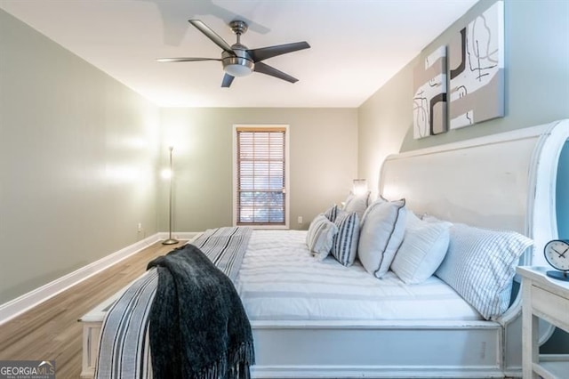 6851 Roswell Rd Unit A-12, Atlanta, GA 30328 - bedroom with wood finished floors, baseboards, and a ceiling fan