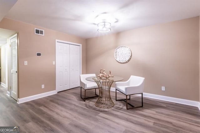 6851 Roswell Rd Unit A-12, Atlanta, GA 30328 - sitting room with baseboards and wood finished floors