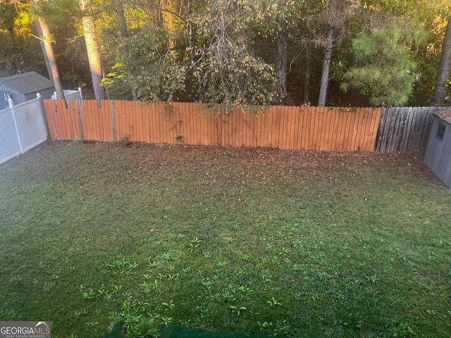 view of yard featuring a fenced backyard