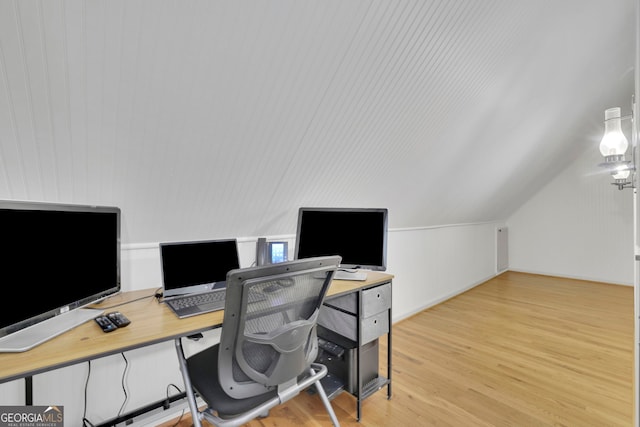 office area featuring lofted ceiling and light wood-style floors