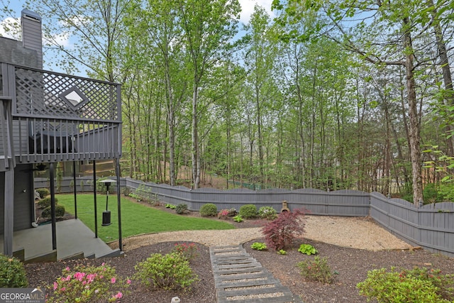view of yard featuring a fenced backyard