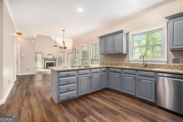 kitchen with a peninsula, gray cabinetry, black electric cooktop, stainless steel dishwasher, and a sink
