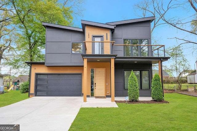 1598 Athens Ave SW, Atlanta, GA 30310 - contemporary home with a balcony, a garage, concrete driveway, and a front yard