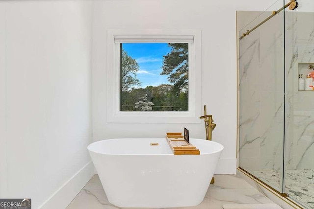 1598 Athens Ave SW, Atlanta, GA 30310 - full bath with marble look tiles, a marble finish shower, and a freestanding bath