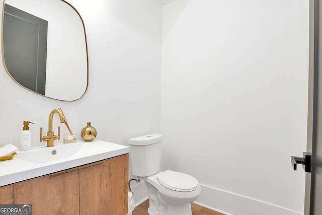 1598 Athens Ave SW, Atlanta, GA 30310 - half bath featuring vanity and wood finished floors