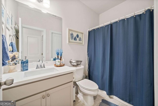 127 Crest Brooke Dr, Canton, GA 30115 - bathroom featuring curtained shower, toilet, tile patterned floors, and vanity