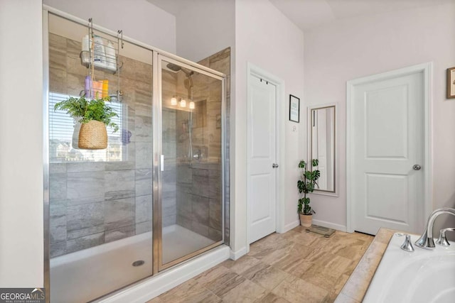 127 Crest Brooke Dr, Canton, GA 30115 - full bath with baseboards, a bathing tub, and a shower stall
