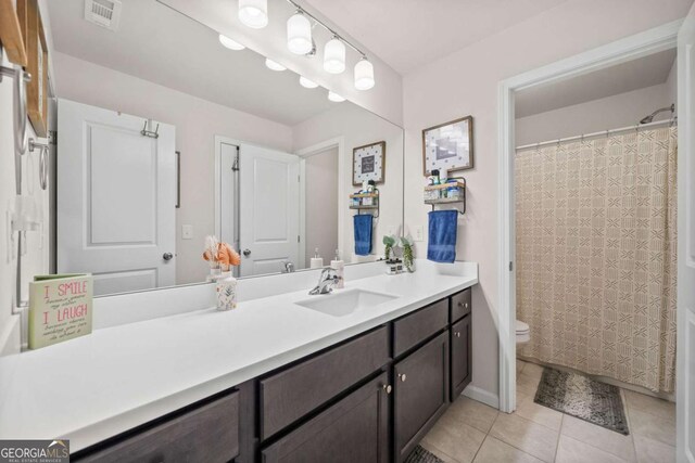 127 Crest Brooke Dr, Canton, GA 30115 - bathroom with tile patterned floors, toilet, curtained shower, vanity, and visible vents