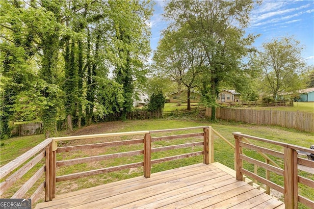 5429 Golfcrest Cir, Stone Mountain, GA 30088 - deck featuring a lawn and fence