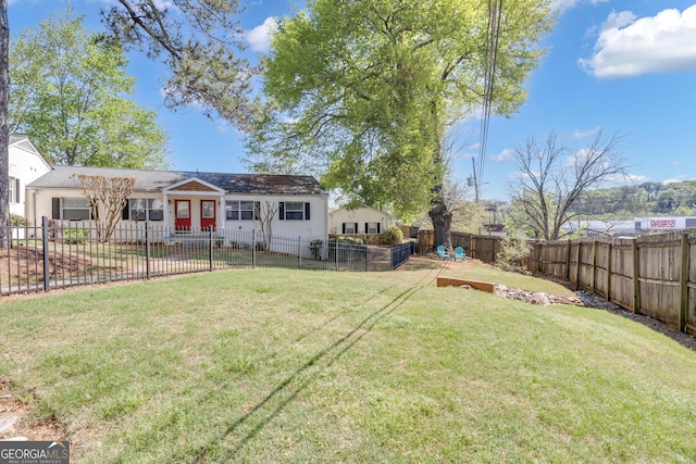 view of yard with a fenced backyard