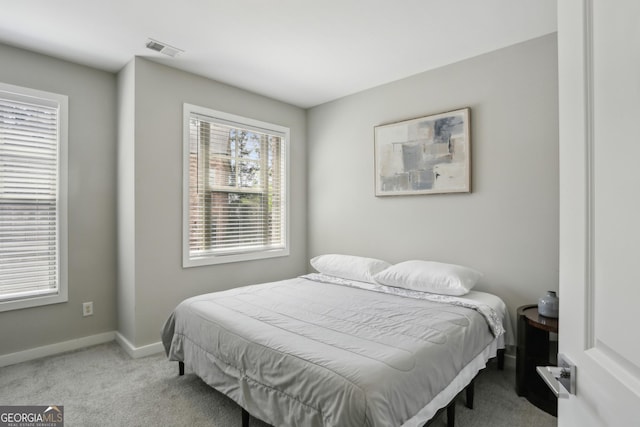 828 Canterbury Overlook NE, Atlanta, GA 30324 - carpeted bedroom featuring baseboards