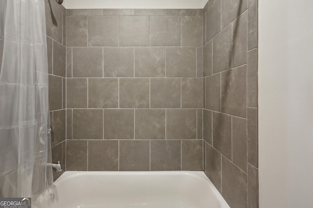 828 Canterbury Overlook NE, Atlanta, GA 30324 - bathroom featuring shower / bath combination with curtain