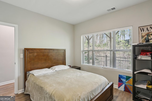 828 Canterbury Overlook NE, Atlanta, GA 30324 - bedroom with wood finished floors and baseboards