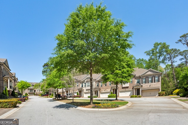 828 Canterbury Overlook NE, Atlanta, GA 30324 - view of asphalt road featuring a residential view and curbs