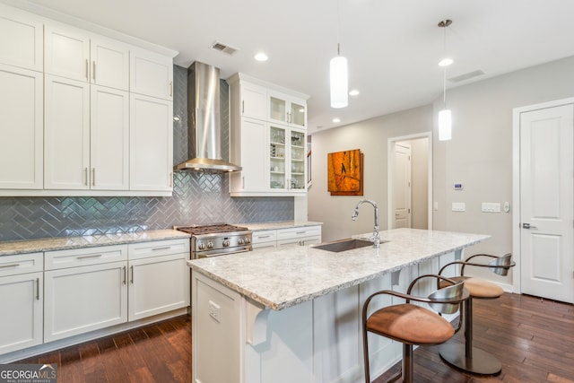828 Canterbury Overlook NE, Atlanta, GA 30324 - kitchen with wall chimney exhaust hood, a sink, dark wood-style flooring, decorative backsplash, and recessed lighting