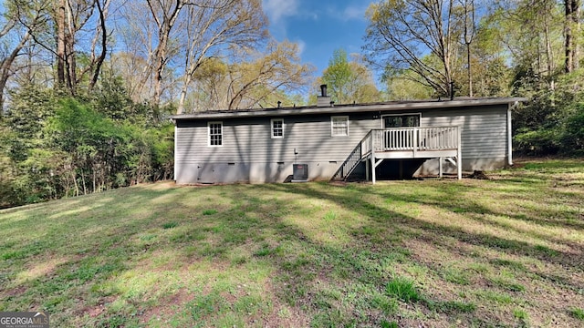 130 Fairview Dr, Stockbridge, GA 30281 - back of house featuring crawl space, cooling unit, a deck, and a yard