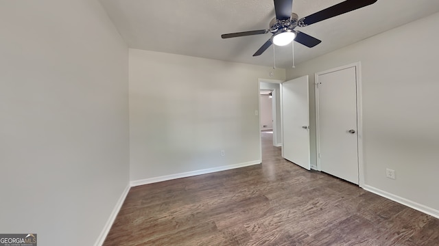 130 Fairview Dr, Stockbridge, GA 30281 - unfurnished bedroom featuring baseboards, ceiling fan, and wood finished floors