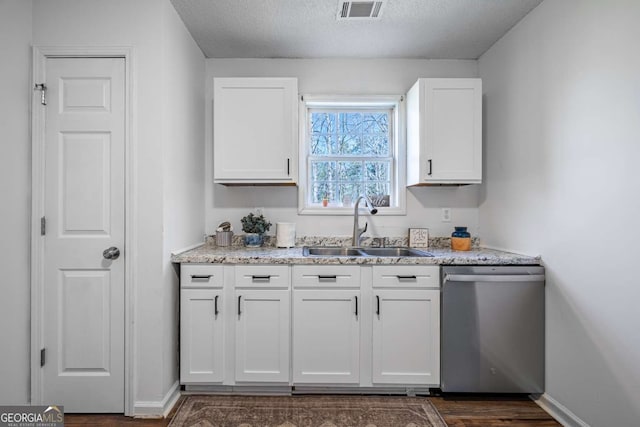 694 Austin Rd, Newnan, GA 30263 - kitchen featuring dishwasher, white cabinets, a textured ceiling, dark wood-type flooring, and light stone counters