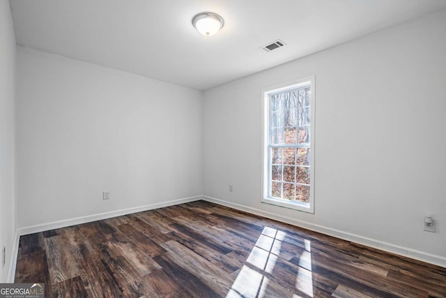 694 Austin Rd, Newnan, GA 30263 - unfurnished room with plenty of natural light and wood finished floors