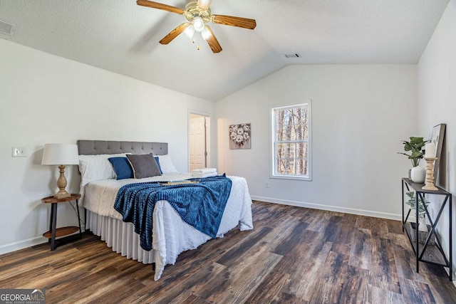 694 Austin Rd, Newnan, GA 30263 - bedroom featuring wood finished floors, vaulted ceiling, and a ceiling fan