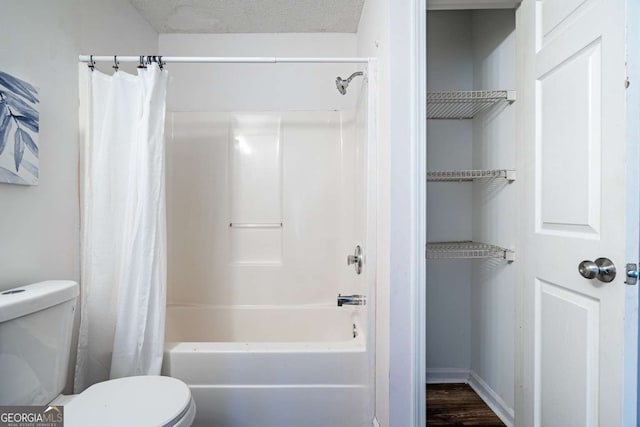 694 Austin Rd, Newnan, GA 30263 - bathroom featuring toilet and shower / tub combo